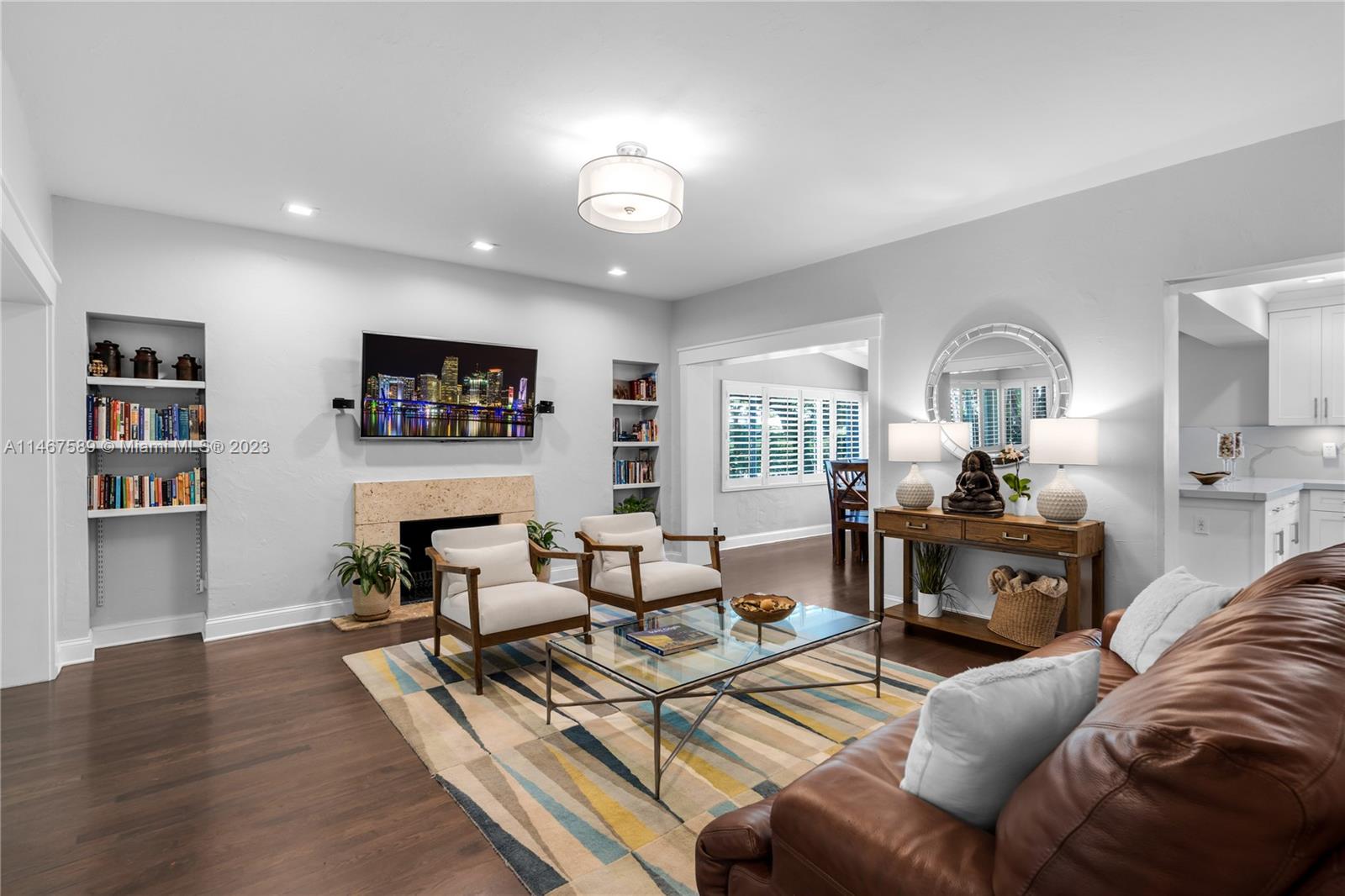 2400 Trapp Avenue Miami, FL 33133 - Photo 9 of 47 a living room with furniture and a wooden floor