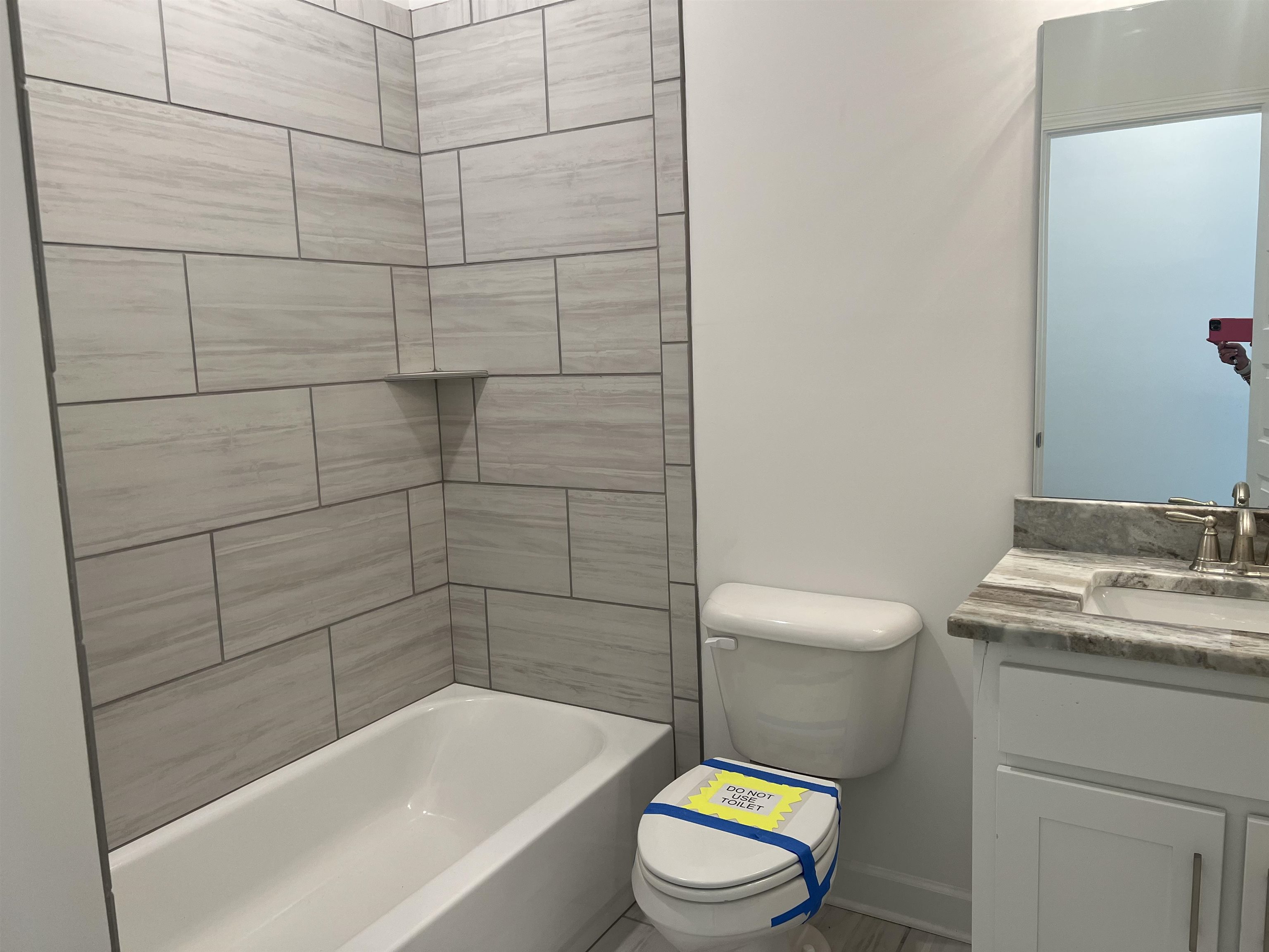 45 Rolling Hill Drive Collierville, TN 38017 - Photo 18 of 24 a bathroom with a sink a toilet and bathtub