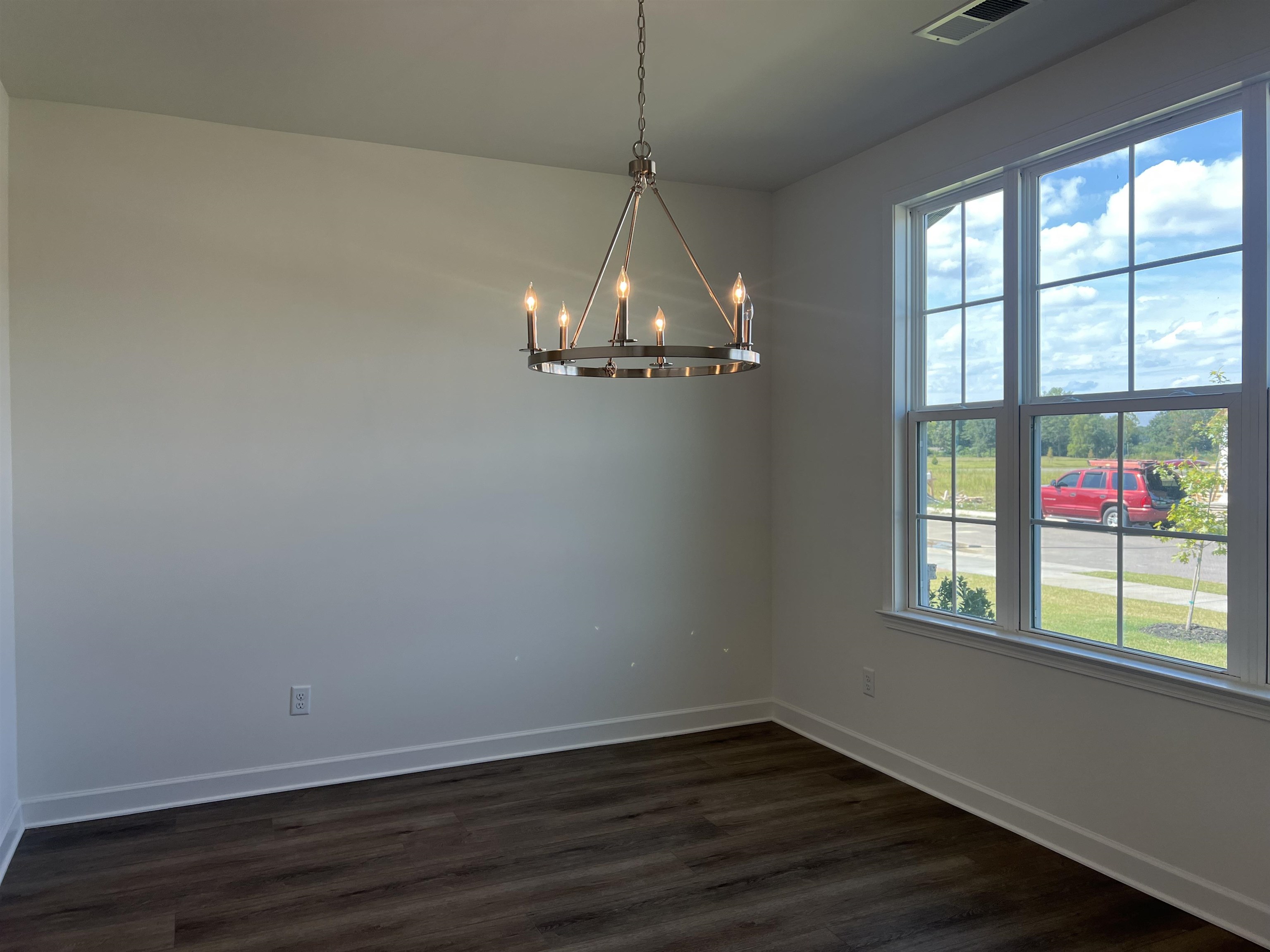 45 Rolling Hill Drive Collierville, TN 38017 - Photo 4 of 24 a view of a room with wooden floor and windows