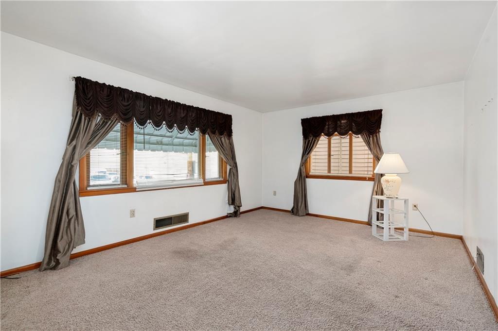 306 Allegheny Street Tarentum, PA 15084 - Photo 2 of 10 an empty room with windows