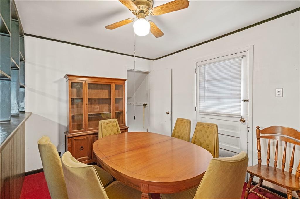 306 Allegheny Street Tarentum, PA 15084 - Photo 4 of 10 a view of a dining room with furniture and wooden floor