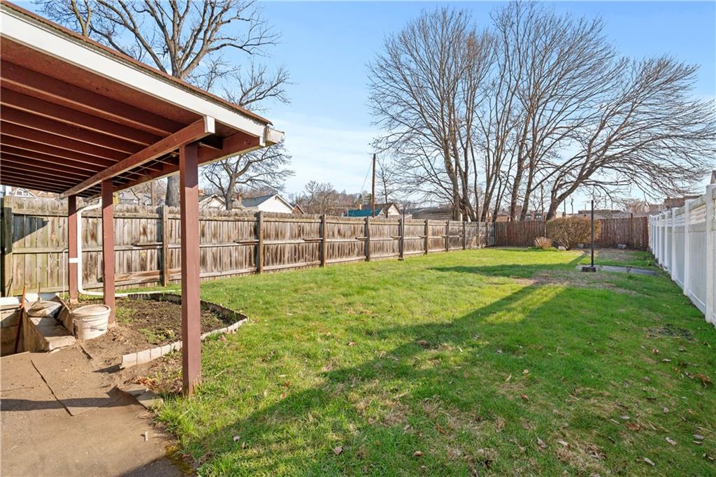 306 Allegheny Street Tarentum, PA 15084 - Photo 10 of 10 a view of a backyard with table and chairs and a fire pit