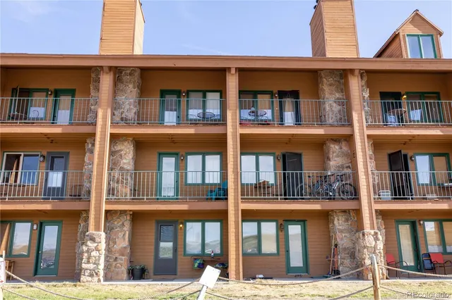 a front view of multi story residential apartment building