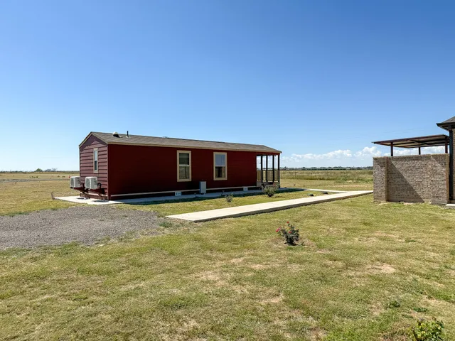 a bathroom with a toilet and a tub