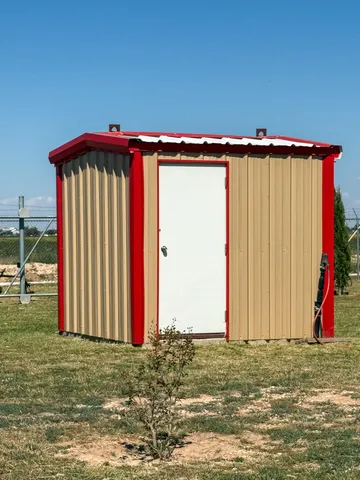 a spacious bathroom with a granite countertop sink and a mirror