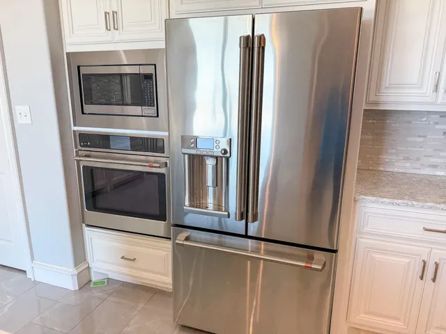a bedroom with a bed and a view of bathroom
