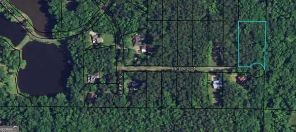 a balcony with lots of green space