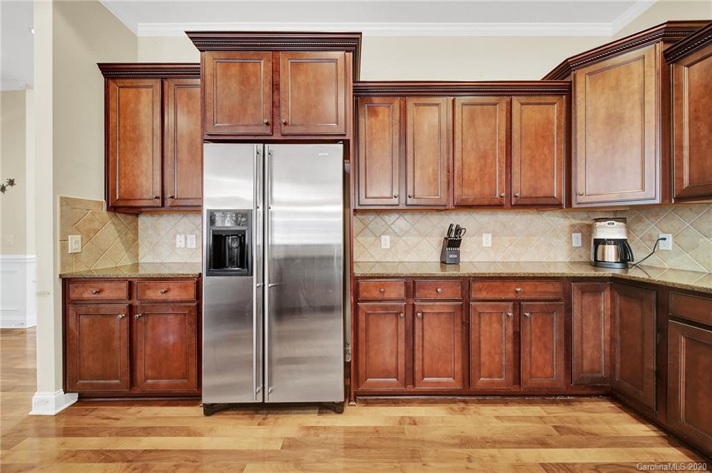 746 Quicksilver Trail Fort Mill, SC 29708 - Photo 13 of 35 a kitchen with stainless steel appliances granite countertop a refrigerator and a sink