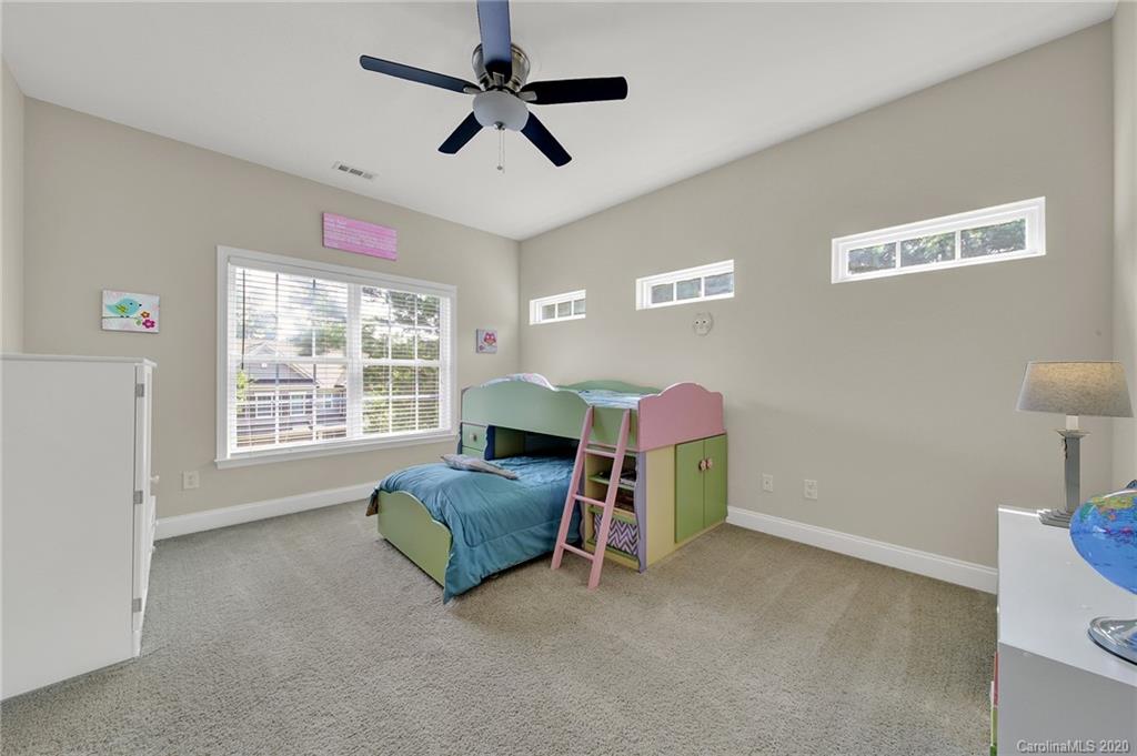 746 Quicksilver Trail Fort Mill, SC 29708 - Photo 20 of 35 a bedroom with furniture and a window