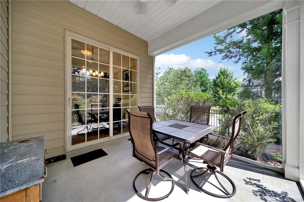 746 Quicksilver Trail Fort Mill, SC 29708 - Photo 32 of 35 a view of a outdoor space with a table and chairs