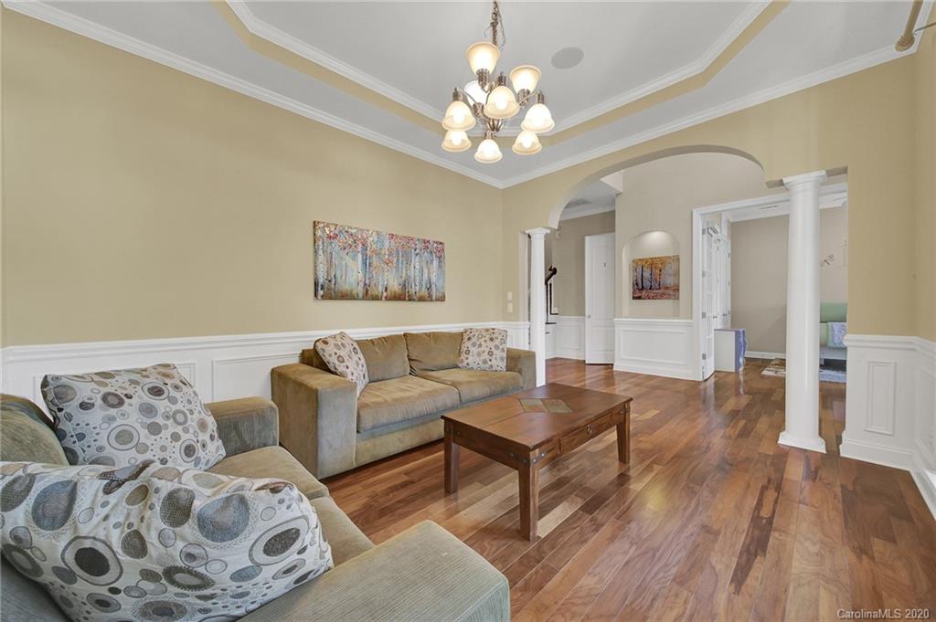 746 Quicksilver Trail Fort Mill, SC 29708 - Photo 5 of 35 a living room with furniture and a chandelier