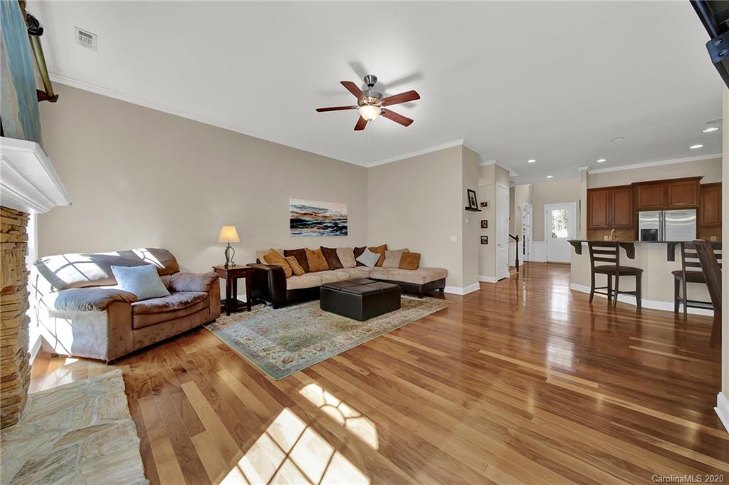 746 Quicksilver Trail Fort Mill, SC 29708 - Photo 8 of 35 a living room with furniture and wooden floor