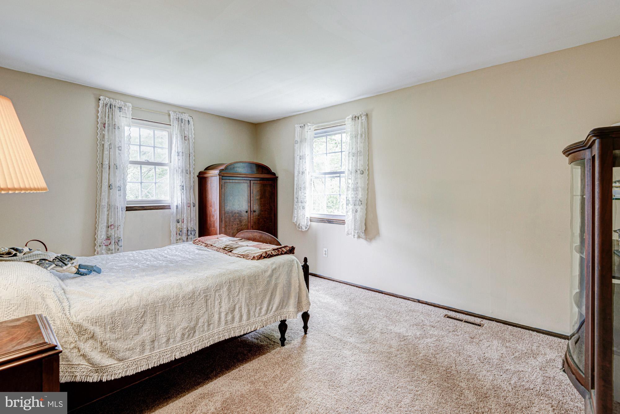 8 Risa Court Newark, DE 19702 - Photo 51 of 58 a bedroom with a bed and a window