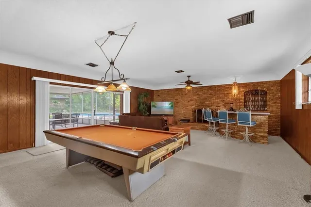 a room with gym equipment and a table