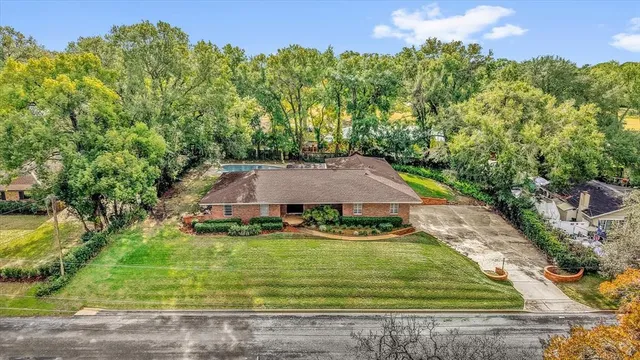a aerial view of a house with garden