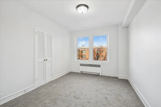 an empty room with window