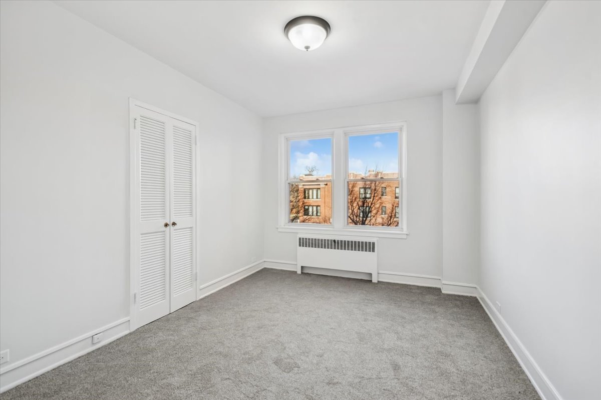 1585 Ridge Avenue, Unit 301 Evanston, IL 60201 - Photo 14 of 22 an empty room with window