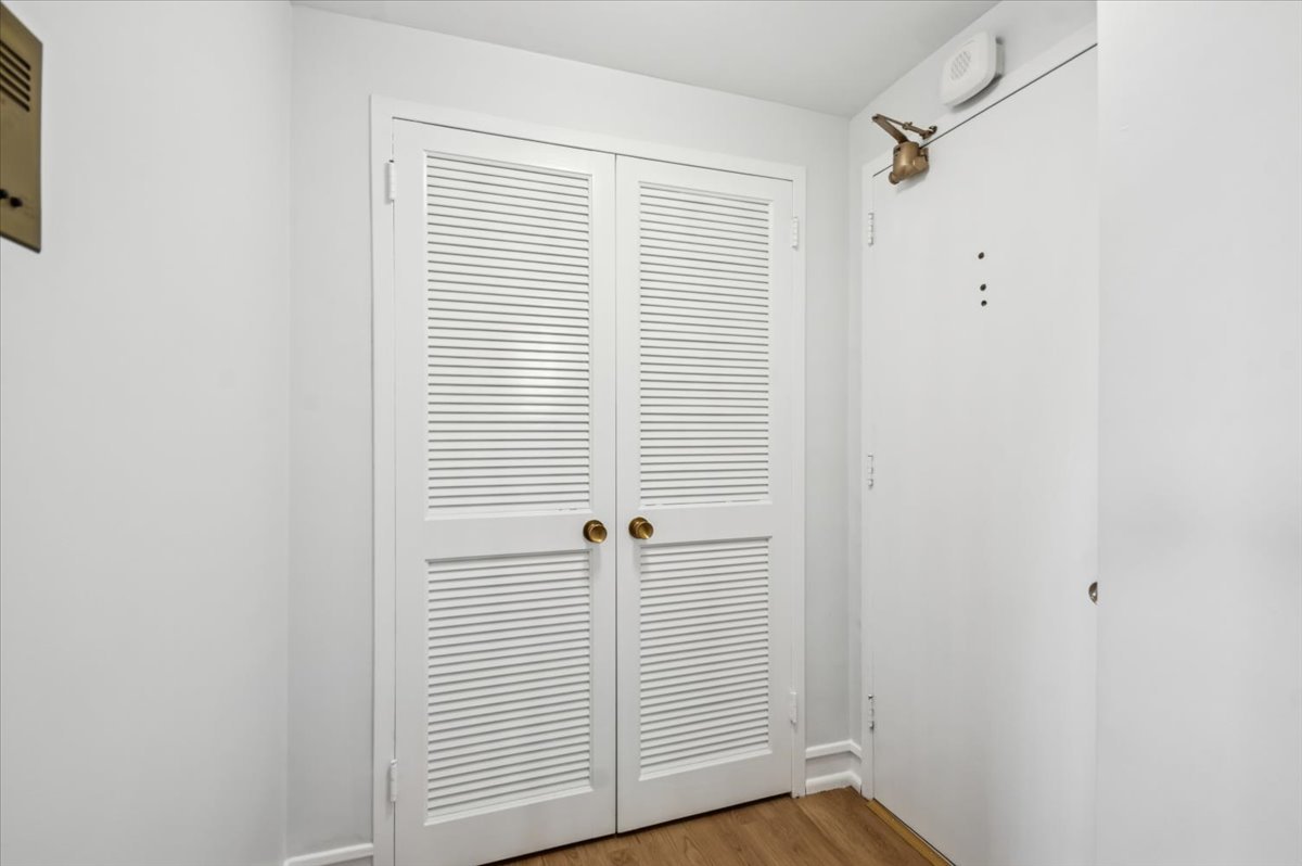 1585 Ridge Avenue, Unit 301 Evanston, IL 60201 - Photo 6 of 22 a view of a room with wooden floor
