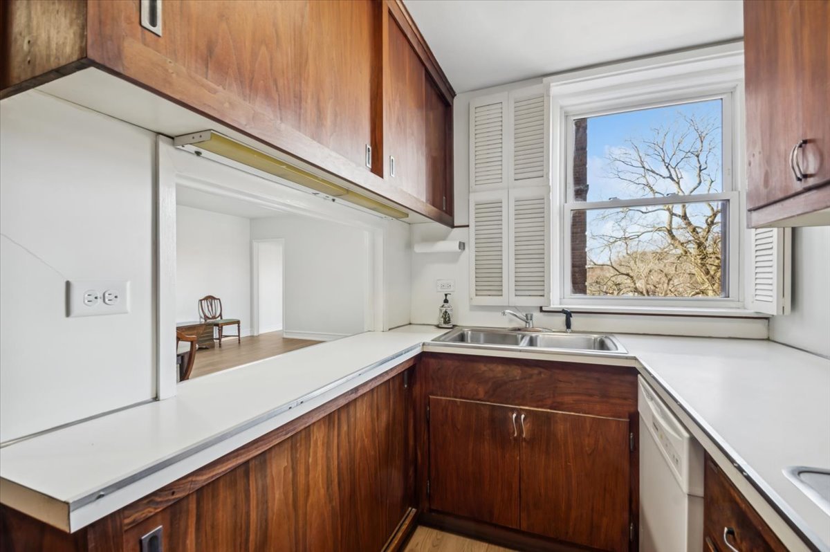 1585 Ridge Avenue, Unit 301 Evanston, IL 60201 - Photo 10 of 22 a kitchen with a sink and a window