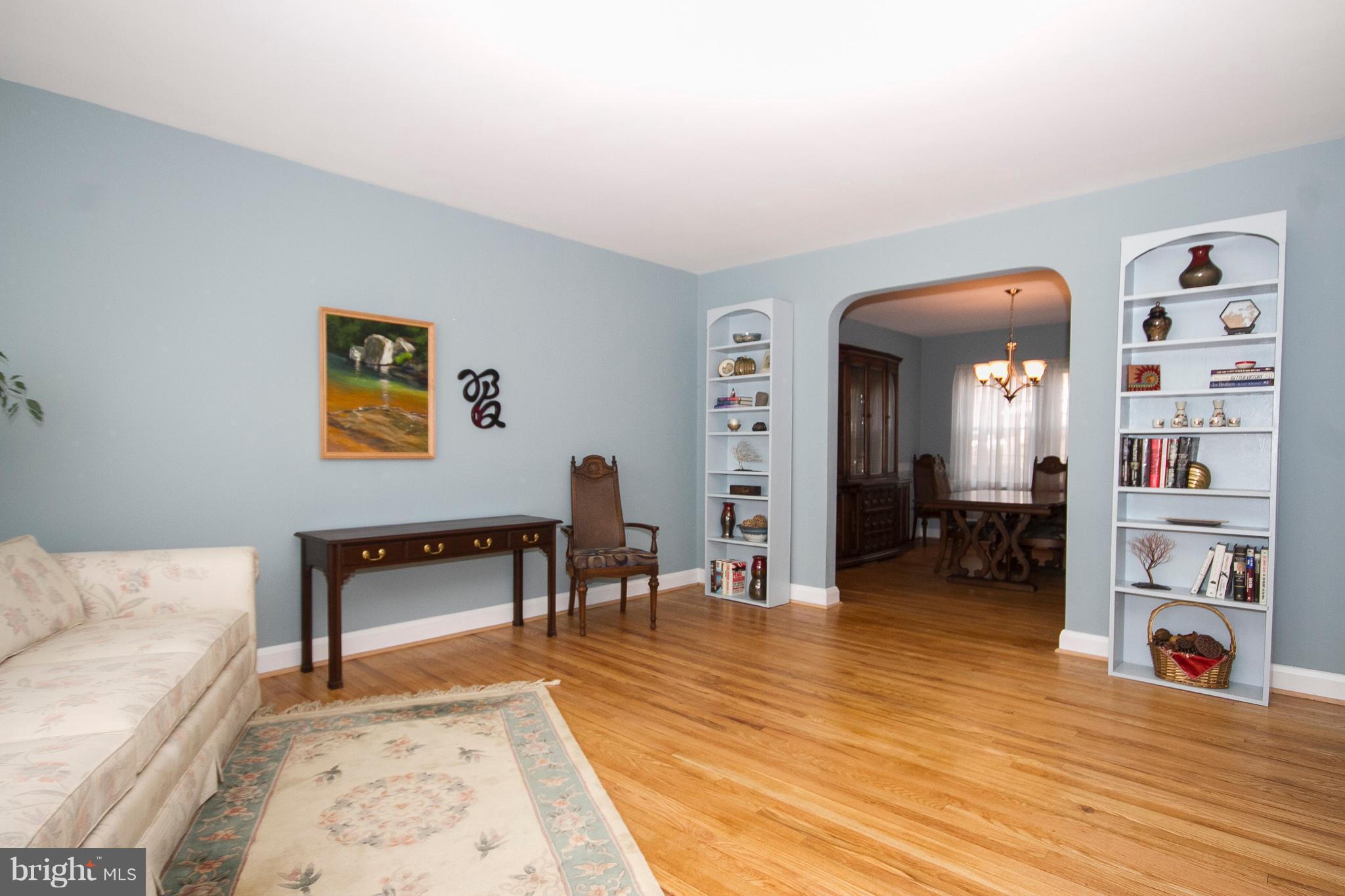 1809 Glen Ridge Road Towson, MD 21286 - Photo 2 of 30 a living room with furniture and a wooden floor