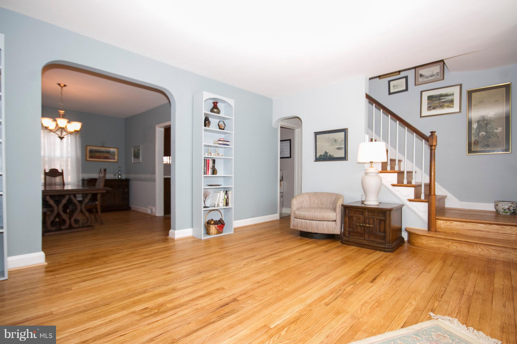 1809 Glen Ridge Road Towson, MD 21286 - Photo 3 of 30 a living room with furniture and a wooden floor