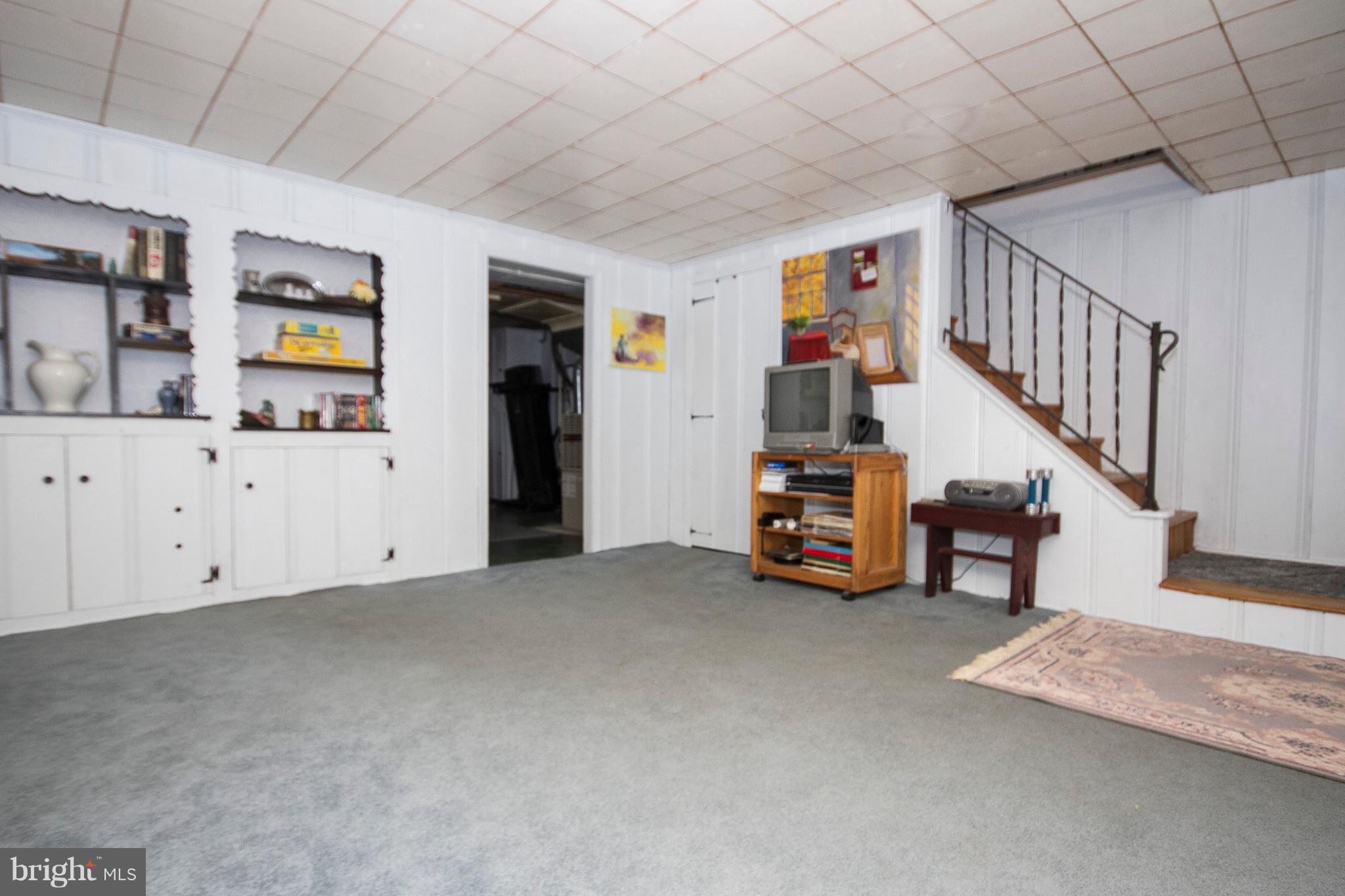 1809 Glen Ridge Road Towson, MD 21286 - Photo 23 of 30 a view of a livingroom with furniture and staircase
