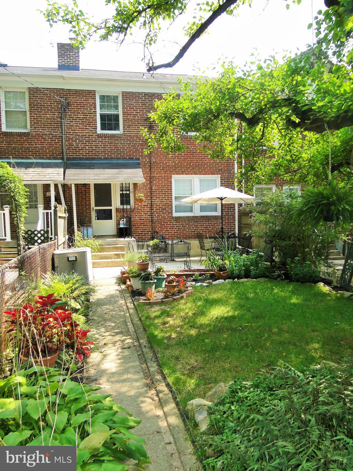 1809 Glen Ridge Road Towson, MD 21286 - Photo 28 of 30 a front view of a house with garden