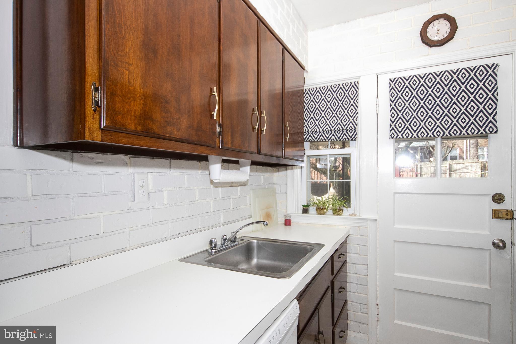 1809 Glen Ridge Road Towson, MD 21286 - Photo 10 of 30 a bathroom with a sink and a mirror