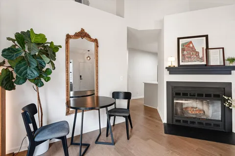 a stove top oven sitting inside of a kitchen