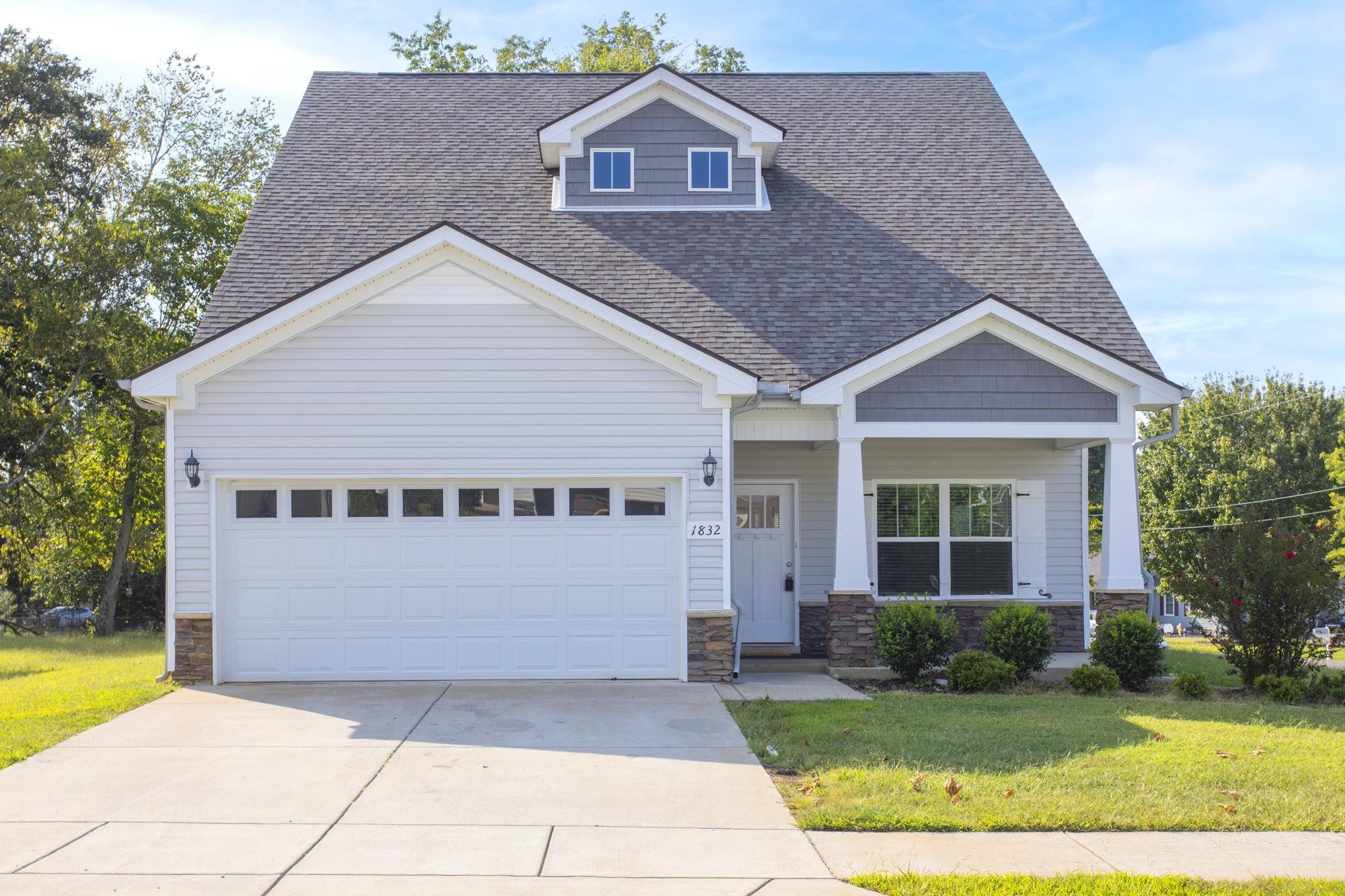a house view with a garden space