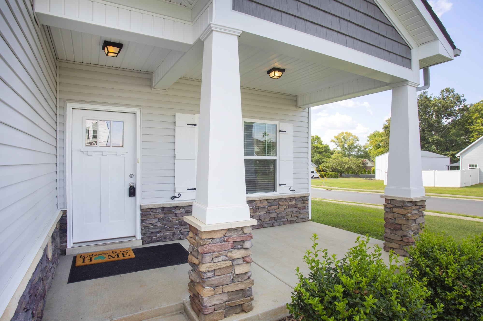 1832 Charismatic Place Murfreesboro, TN 37128 - Photo 2 of 45 a front view of a house with a garden