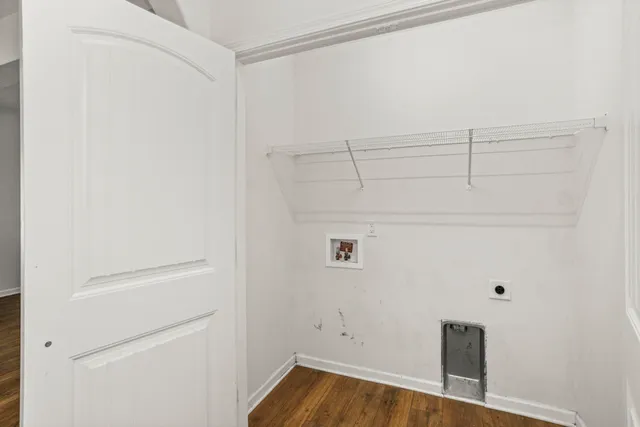 a view of small space with racks on the wall