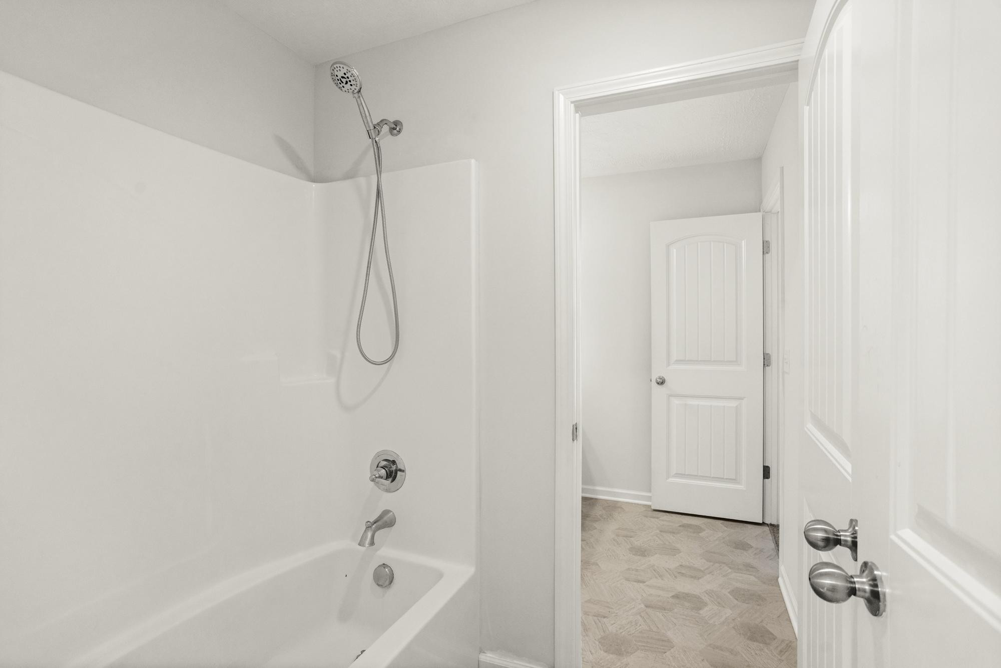 1832 Charismatic Place Murfreesboro, TN 37128 - Photo 31 of 45 a bathroom with a bath tub with shower