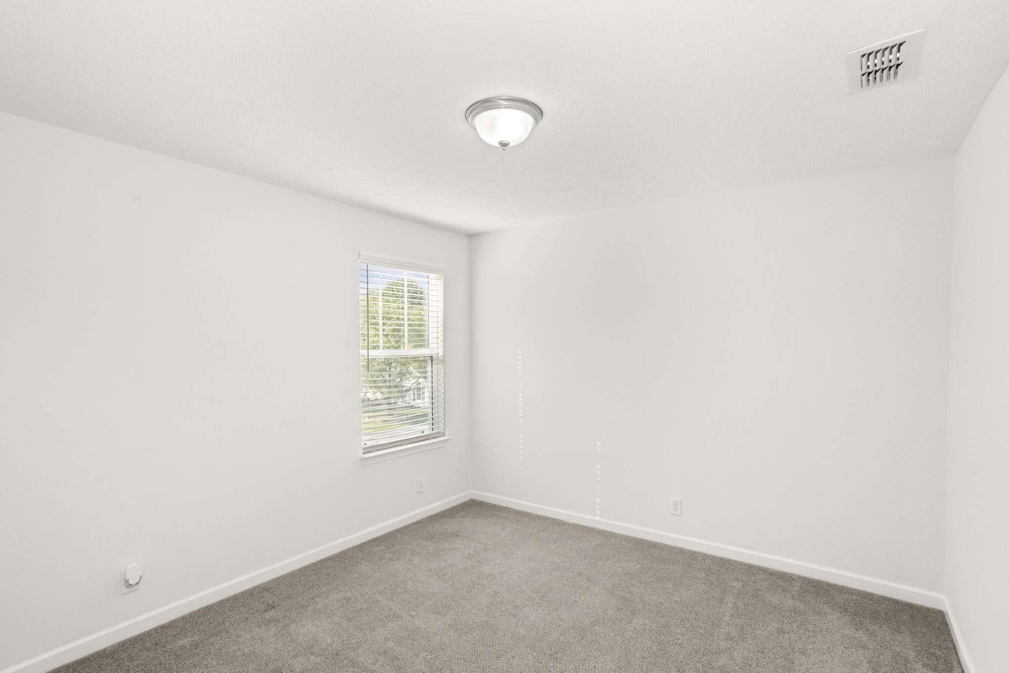 1832 Charismatic Place Murfreesboro, TN 37128 - Photo 33 of 45 a view of an empty room with a window