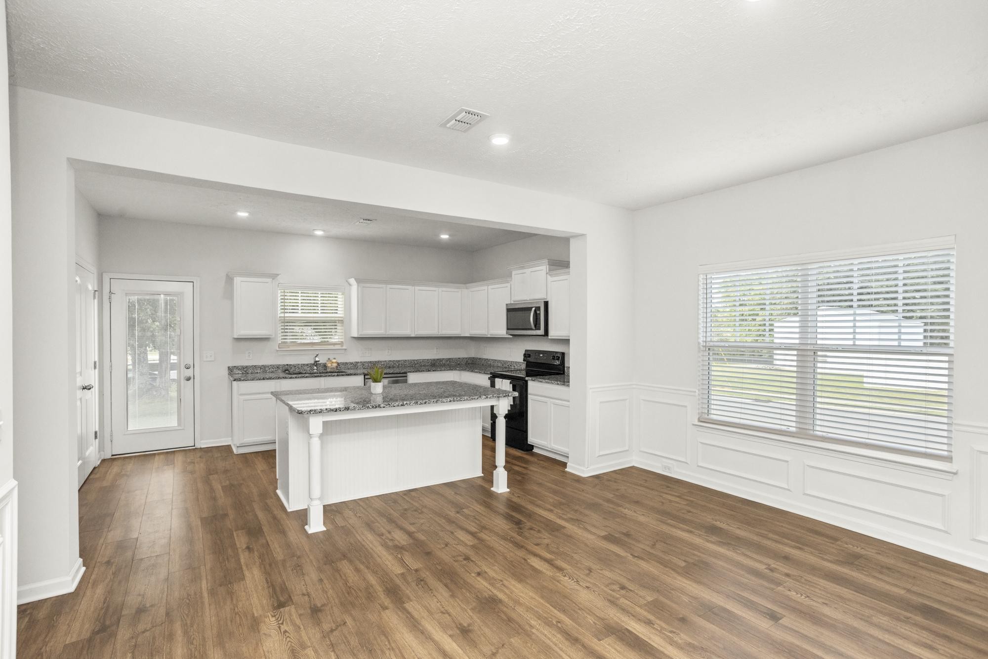 1832 Charismatic Place Murfreesboro, TN 37128 - Photo 9 of 45 a kitchen with a sink and wooden floor