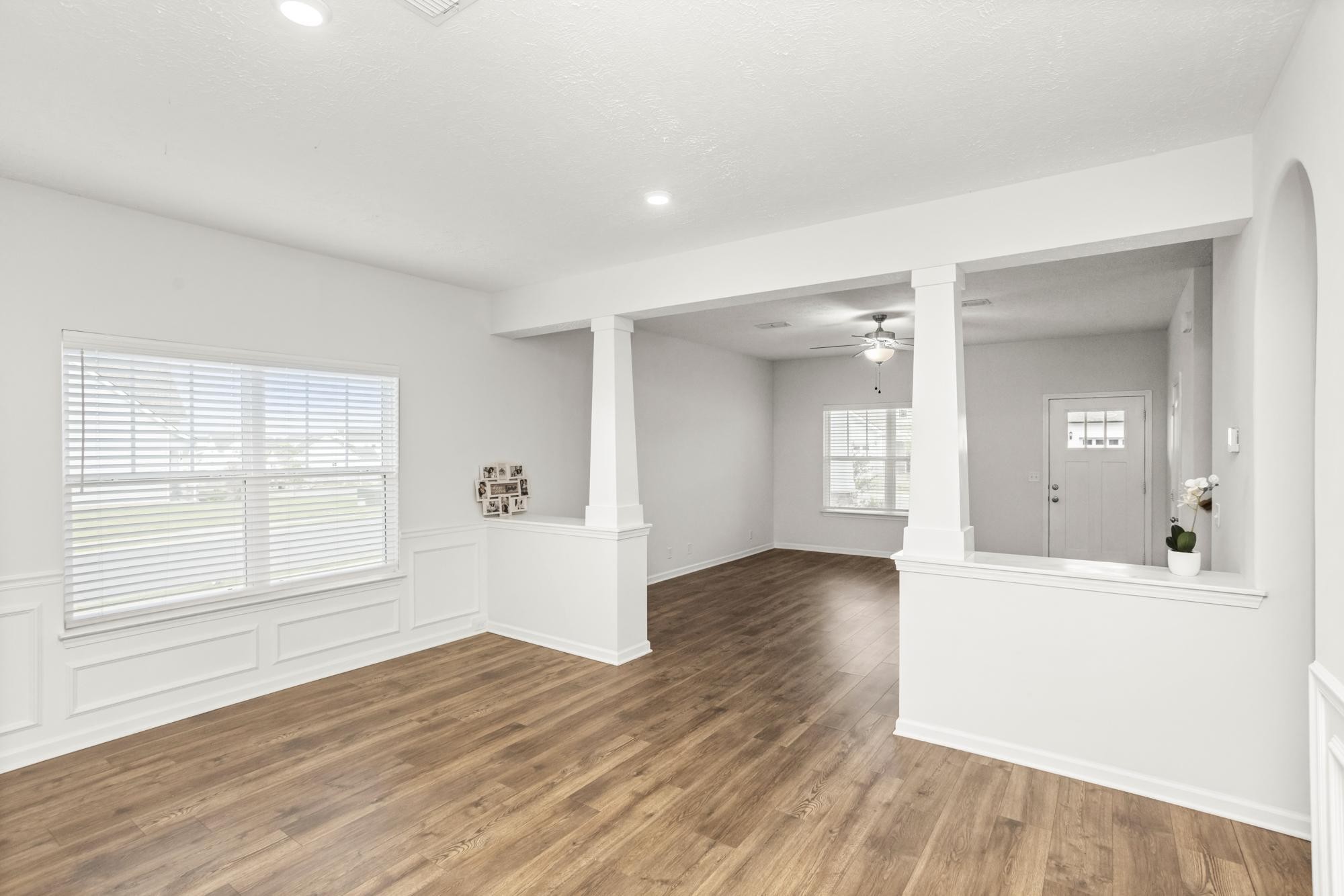 1832 Charismatic Place Murfreesboro, TN 37128 - Photo 10 of 45 a view of an empty room with wooden floor and a window
