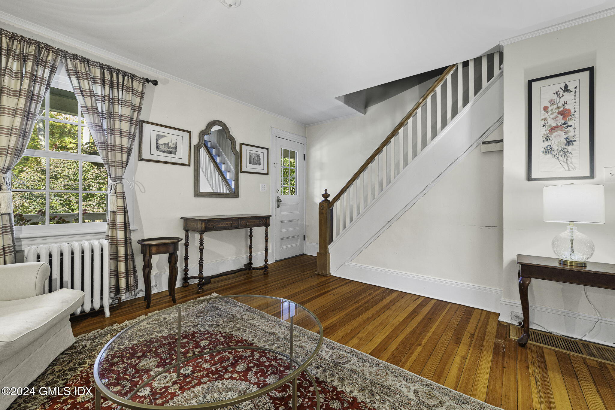 69 Riverside Avenue Riverside, CT 06878 - Photo 3 of 33 a view of a bedroom with furniture window and wooden floor