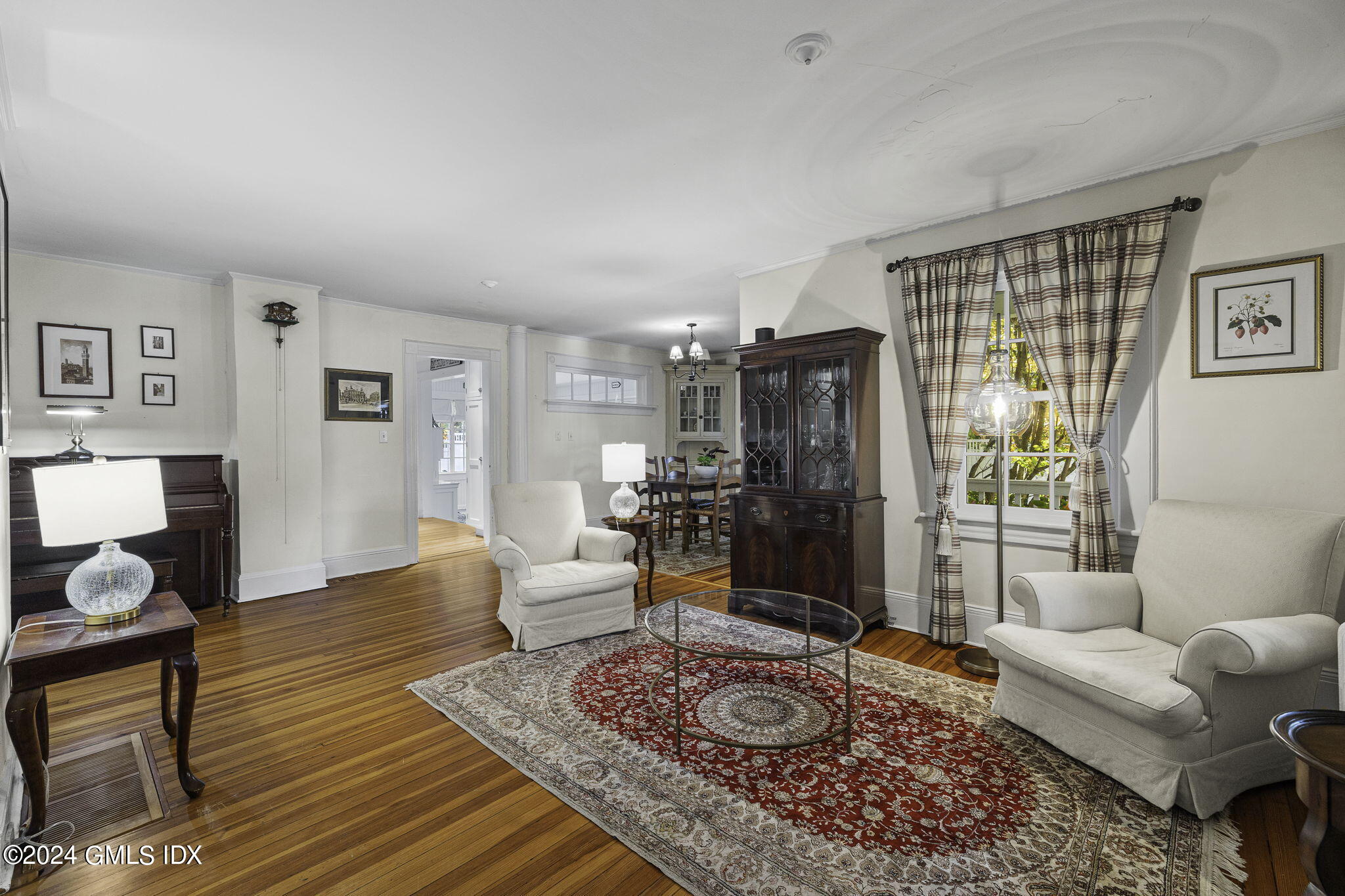 69 Riverside Avenue Riverside, CT 06878 - Photo 4 of 33 a living room with furniture and wooden floor