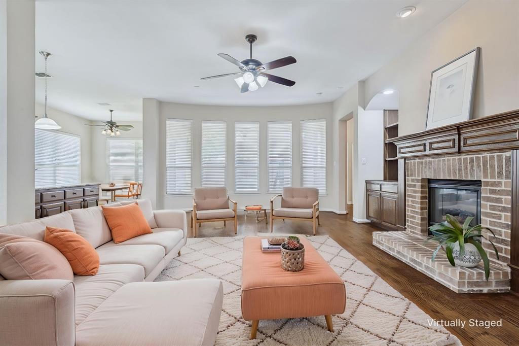 1803 Caprock Road Allen, TX 75002 - Photo 3 of 32 Living room with fireplace