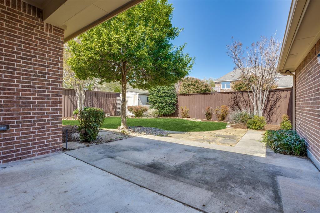 1803 Caprock Road Allen, TX 75002 - Photo 31 of 32 Covered and extended patio