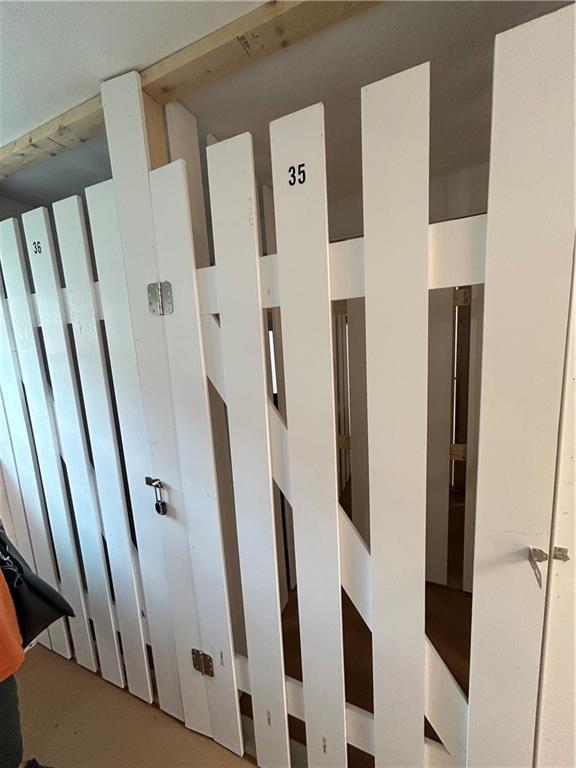 5900 Babcock Boulevard, Unit 35 Pittsburgh, PA 15237 - Photo 14 of 15 a view of a hallway with wooden floor and staircase