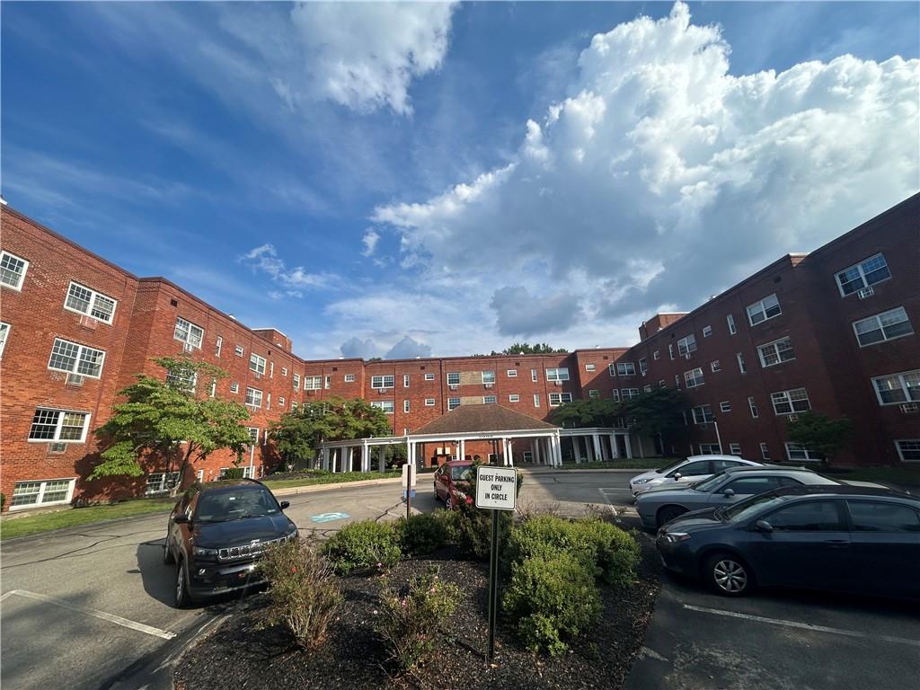 5900 Babcock Boulevard, Unit 35 Pittsburgh, PA 15237 - Photo 2 of 15 a car parked on the side of a street