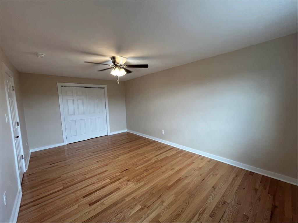 5900 Babcock Boulevard, Unit 35 Pittsburgh, PA 15237 - Photo 10 of 15 a view of an empty room with a ceiling fan