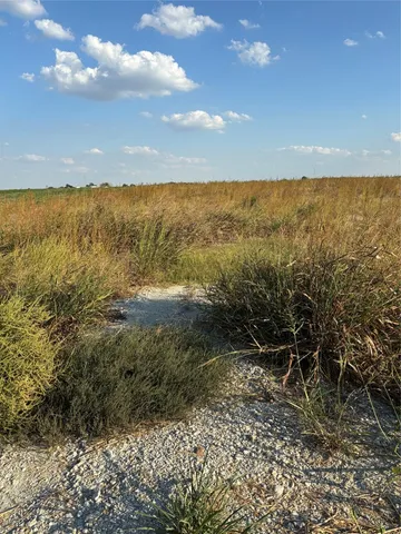 a view of an ocean and a mountain