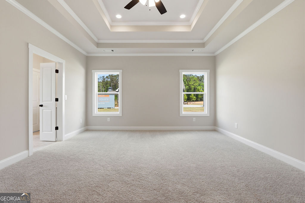 720 Youth Jersey Road Loganville, GA 30052 - Photo 16 of 31 a view of an empty room with window and closet area