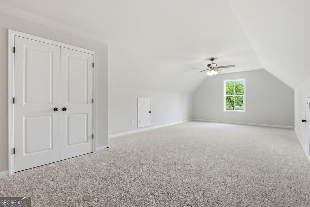 720 Youth Jersey Road Loganville, GA 30052 - Photo 27 of 31 a view of an empty room with a window
