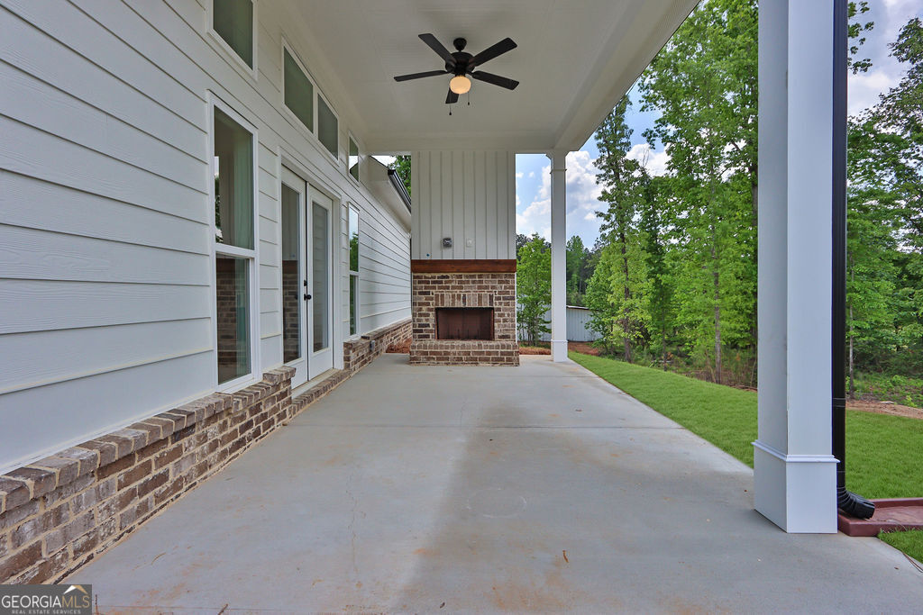 720 Youth Jersey Road Loganville, GA 30052 - Photo 30 of 31 a view of a house with porch and garden