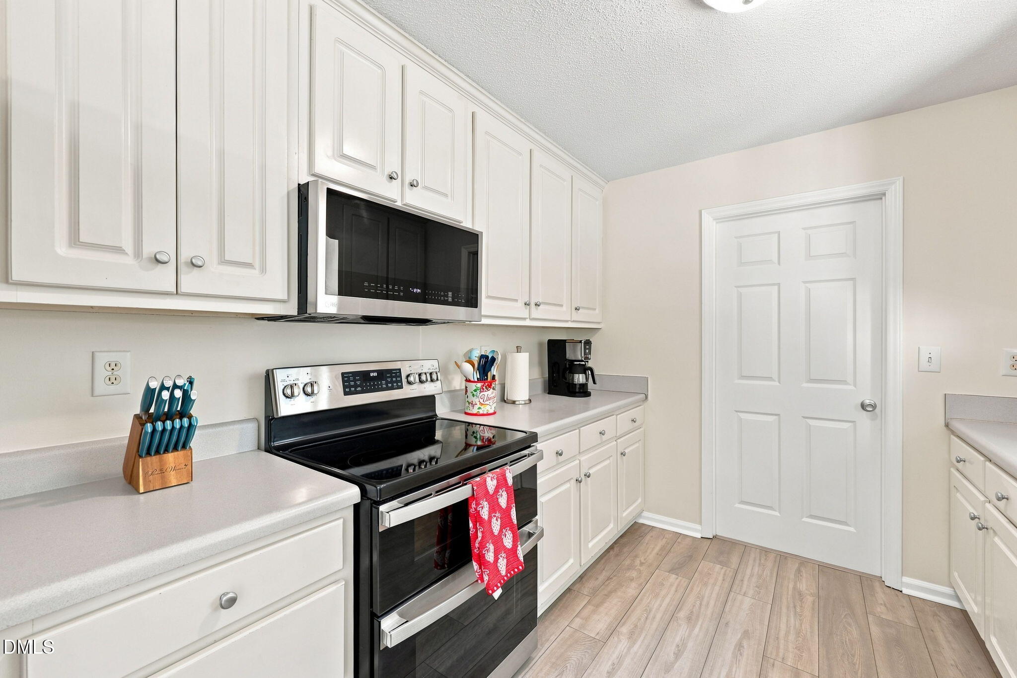 5419 Cleveland Road Clayton, NC 27520 - Photo 12 of 39 Stainless range and built-in microwave