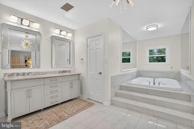 a bedroom with bed and a window