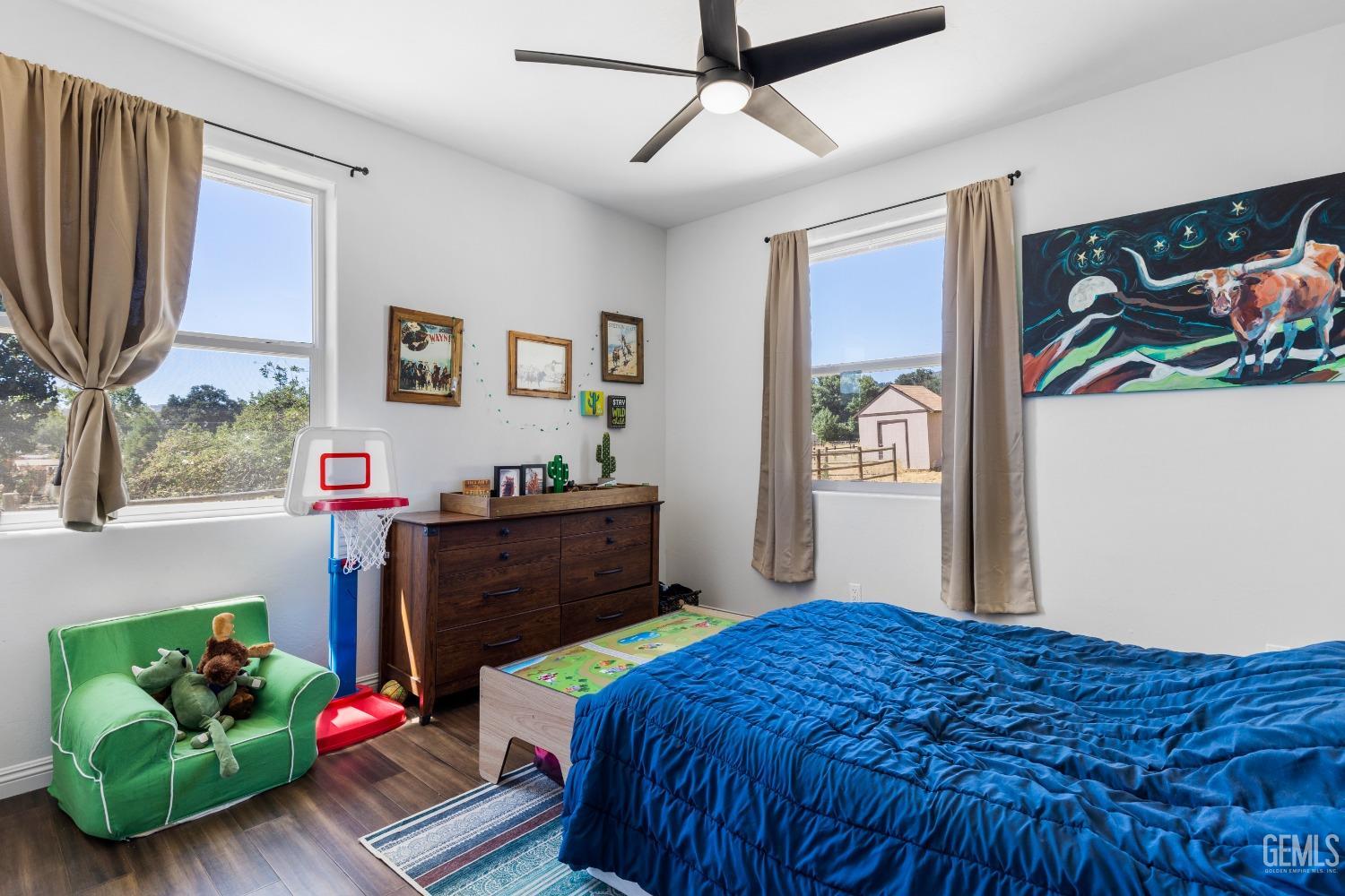 Undisclosed Address Tehachapi, CA 93561 - Photo 23 of 41 a bedroom with bed and a window